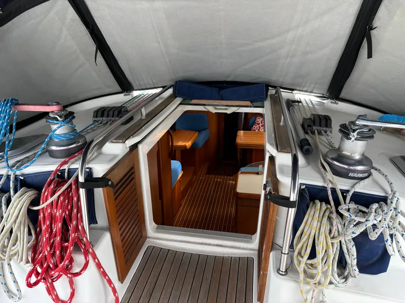 Slide: The Image of Jeanneau Sun Odyssey 43 DS cockpit with ropes and winches, showcasing interior entry, 2001 model. - 21