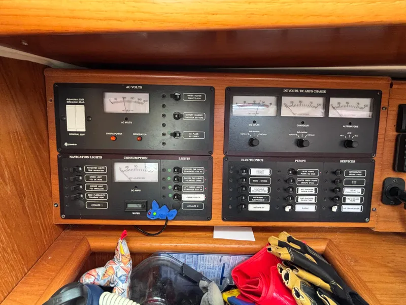 Slide: The Image of Control panel of 2001 Jeanneau Sun Odyssey 43 DS sailboat with navigation and electrical systems. - 26