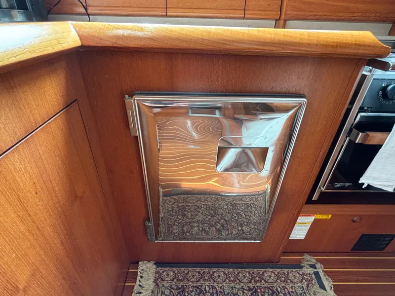 Slide: The Image of Stainless steel appliance in Jeanneau Sun Odyssey 43 DS yacht kitchen, 2001 model. - 31