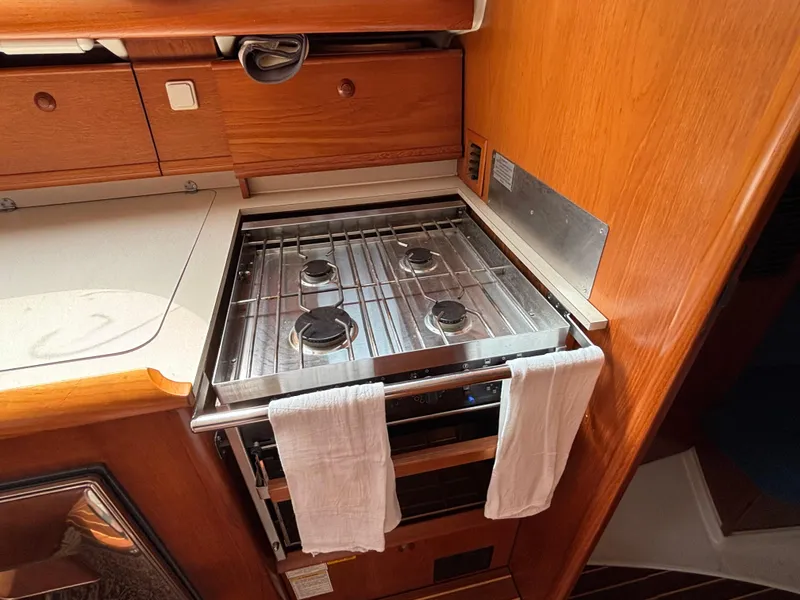Slide: The Image of Galley stove in 2001 Jeanneau Sun Odyssey 43 DS sailboat kitchen. - 32