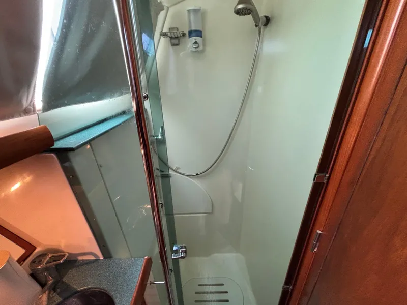Slide: The Image of Shower area in 2001 Jeanneau Sun Odyssey 43 DS yacht, featuring modern fixtures and compact design. - 42