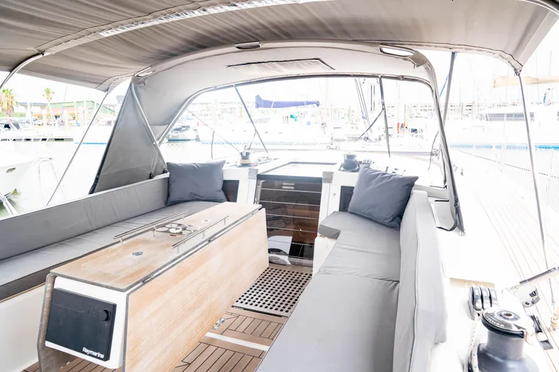 Slide: The Image of Spacious cockpit of 2023 Dufour 530 yacht with comfortable seating and modern design. - 13