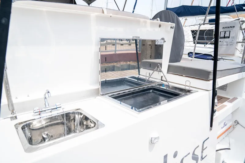 Slide: The Image of Outdoor kitchen on 2023 Dufour 530 yacht with sink and grill. - 21