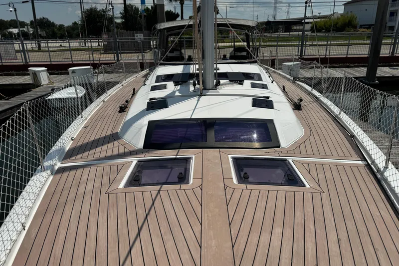Slide: The Image of 2023 Dufour 530 yacht deck with sleek design and modern features. - 26