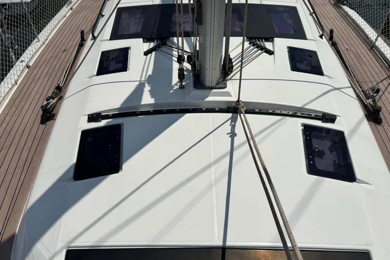 Slide: The Image of 2023 Dufour 530 yacht deck with sleek design and modern fittings. - 27