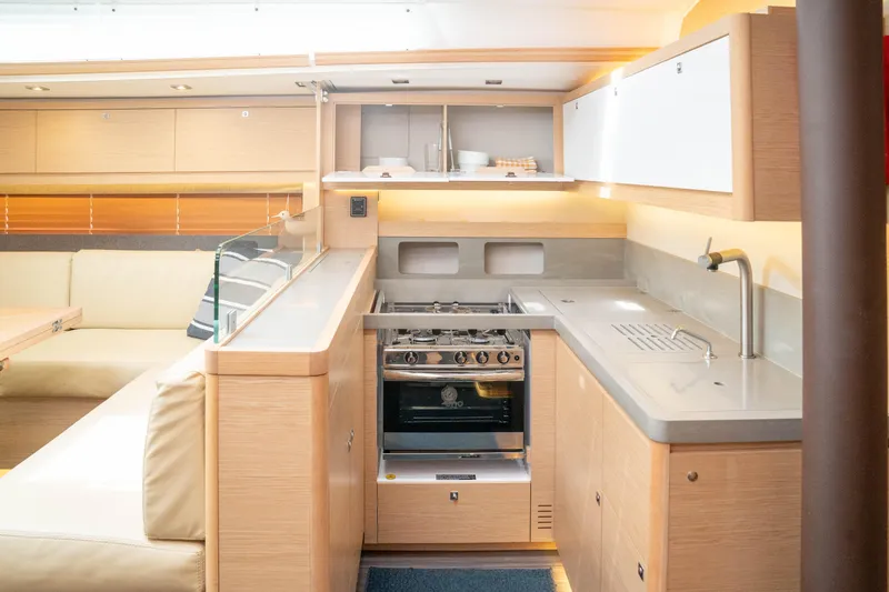 Slide: The Image of Modern kitchen interior of 2023 Dufour 530 yacht with sleek design and amenities. - 38