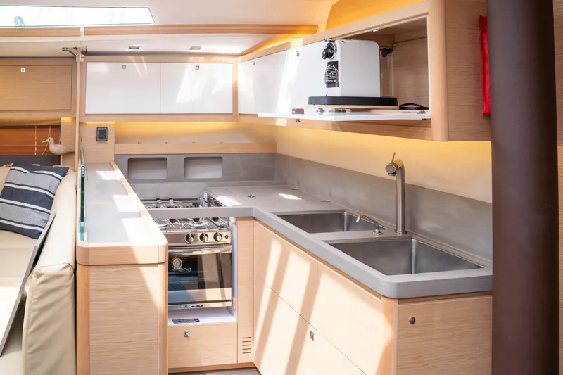 Slide: The Image of Modern kitchen interior of 2023 Dufour 530 yacht with sleek design and appliances. - 39