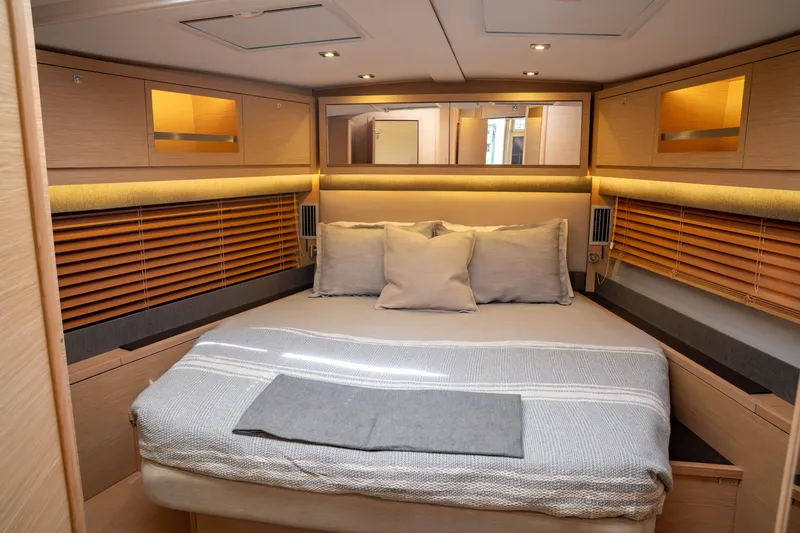 Slide: The Image of Luxurious cabin interior of 2023 Dufour 530 yacht with cozy bed and modern design. - 47