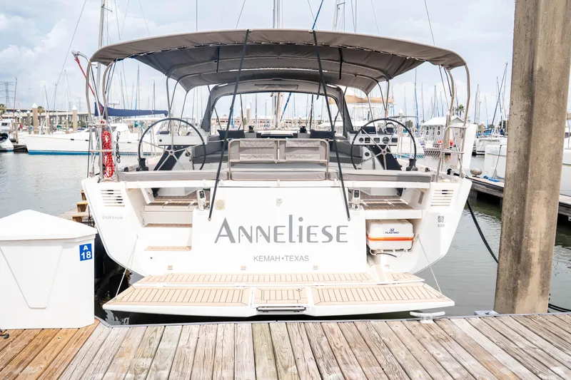 Slide: The Image of 2023 Dufour 530 yacht docked in Kemah, Texas marina. - 5