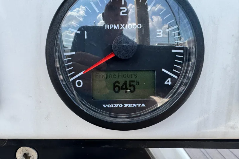 Slide: The Image of Volvo Penta tachometer showing 645 engine hours on Dufour 530, 2023 model. - 57