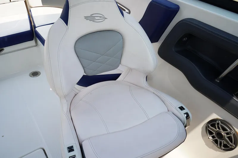 Slide: The Image of 2020 Chaparral 257 SSX boat seat with white and blue upholstery. - 15