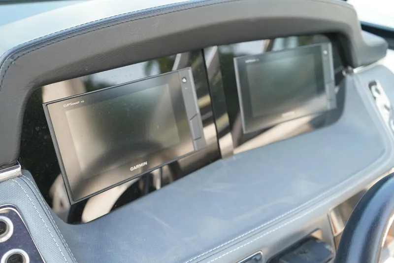 Slide: The Image of Dashboard of 2020 Chaparral 257 SSX with dual Garmin displays. - 31