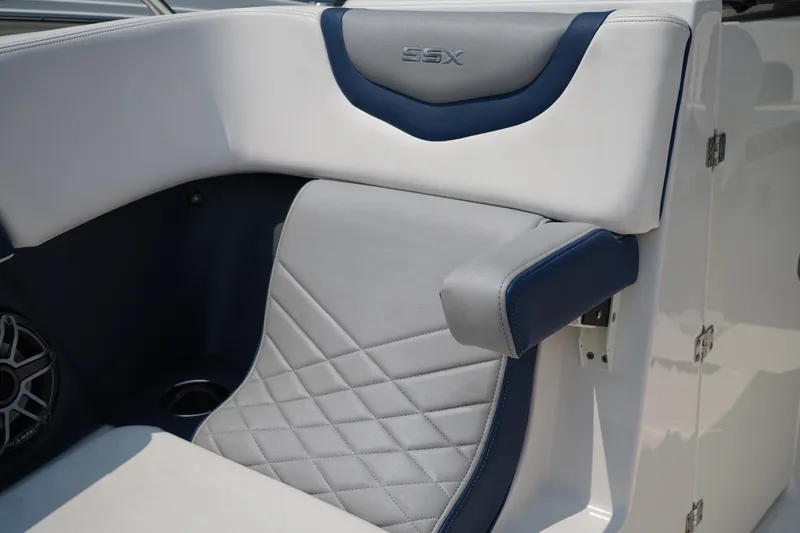 Slide: The Image of 2020 Chaparral 257 SSX boat interior with stylish seating and speaker detail. - 35