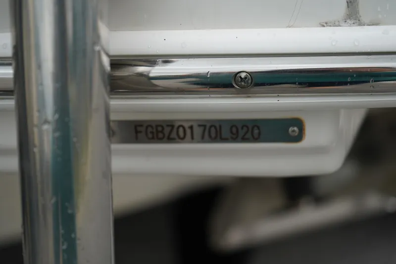 Slide: The Image of 2020 Chaparral 257 SSX boat hull identification number (HIN) plate close-up. - 44