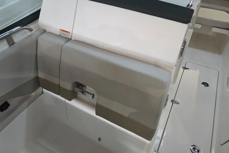 Slide: The Image of 2026 Boston Whaler 240 Vantage interior seating and storage detail. - 7