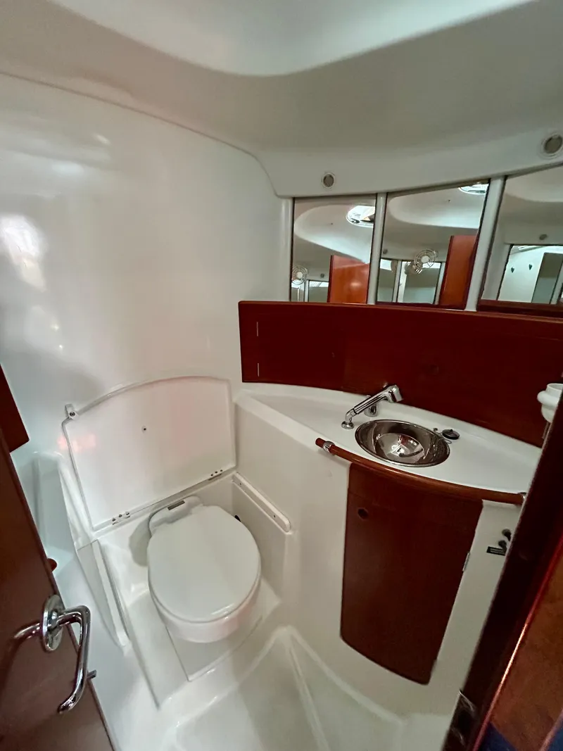 Slide: The Image of 2003 Beneteau First 47.7 yacht bathroom with sink and toilet. - 25