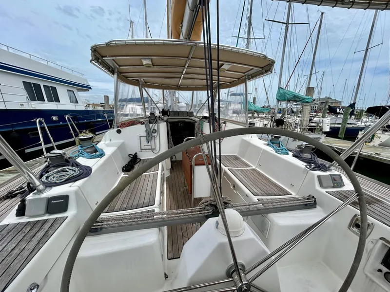 Slide: The Image of Cockpit view of 2003 Beneteau First 47.7 sailboat docked at marina. - 5