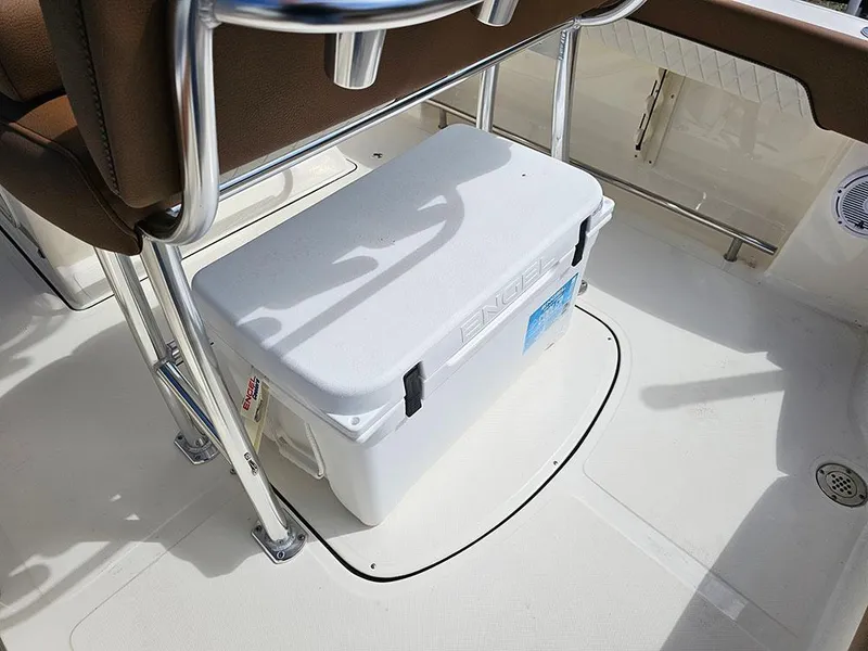 Slide: The Image of 2025 Pioneer 202 Islander boat interior with cooler under seat. - 13