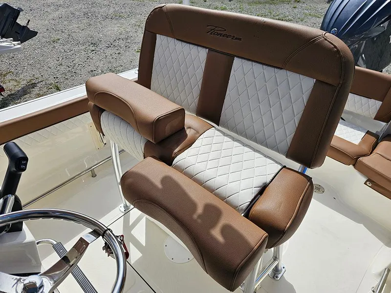 Slide: The Image of 2025 Pioneer 202 Islander boat seat with brown and white diamond-patterned upholstery. - 15