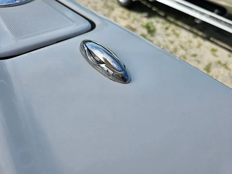 Slide: The Image of 2025 Pioneer 202 Islander boat detail with sleek chrome fixture on deck. - 25