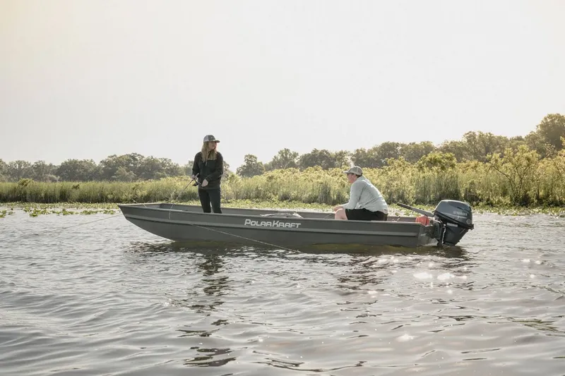 Slide: The Image of Two people fishing on a 2023 Polar Kraft Jon DKJ1648-15 boat. - 11