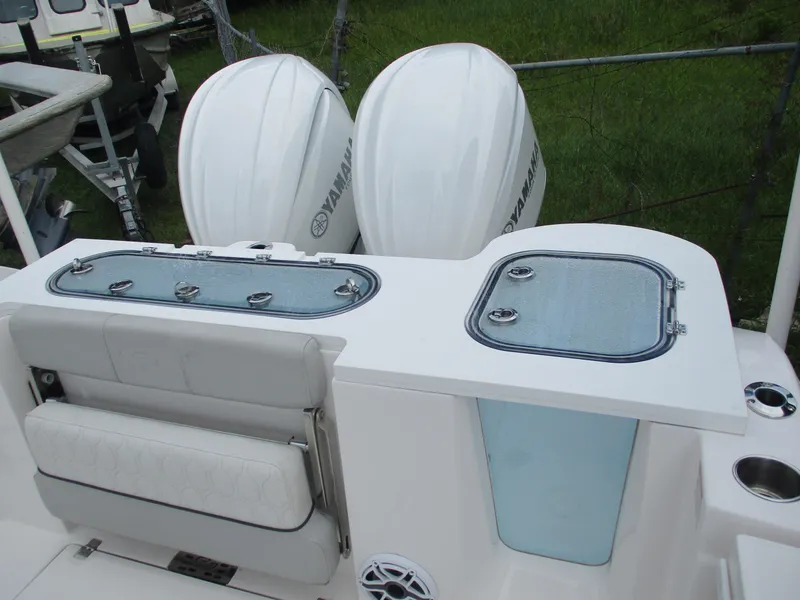 Slide: The Image of 2022 Sea Fox 288 Commander boat with dual Yamaha engines and seating area. - 12