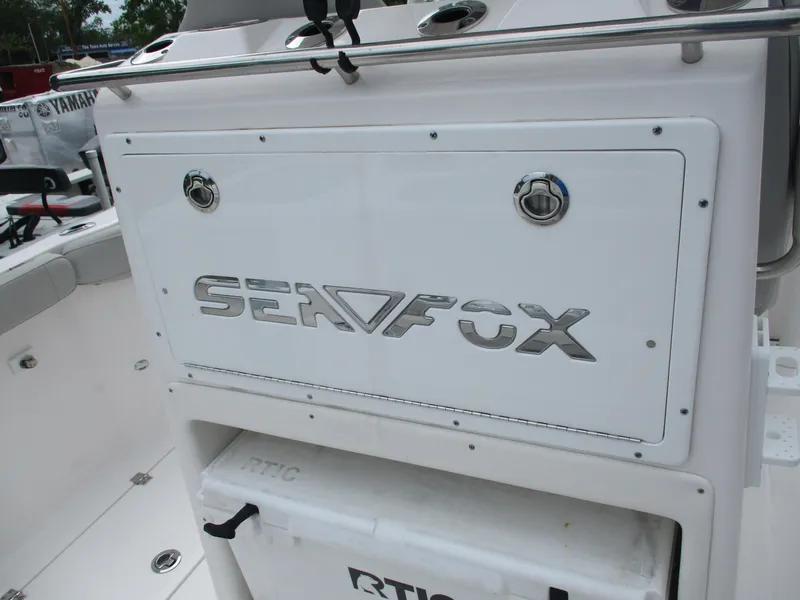 Slide: The Image of 2022 Sea Fox 288 Commander boat interior with branded storage compartment. - 13
