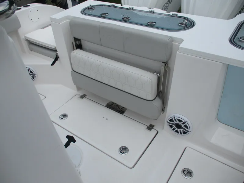 Slide: The Image of 2022 Sea Fox 288 Commander boat interior with foldable seating and storage compartments. - 15