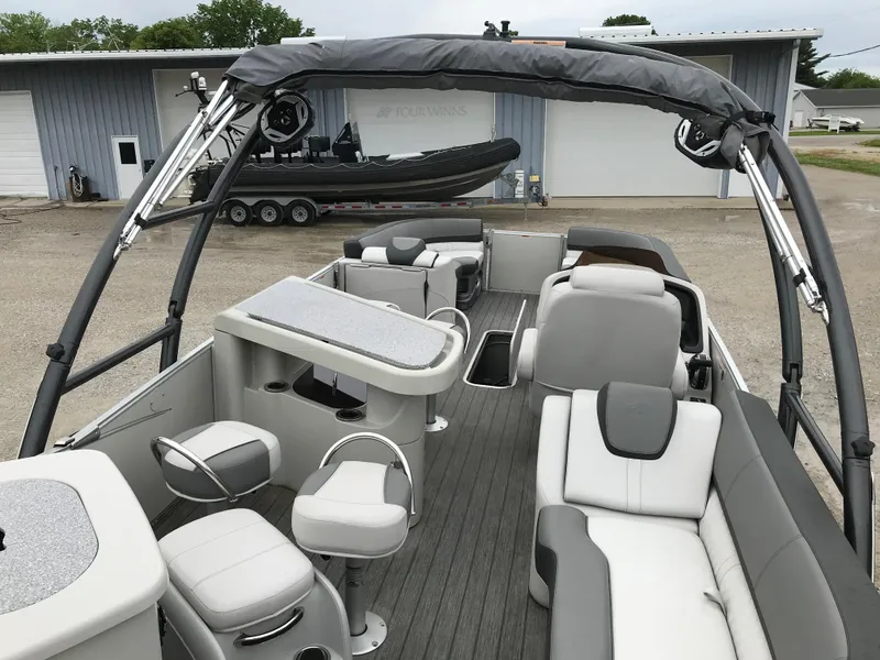 Slide: The Image of 2021 Avalon Catalina Entertainer 25' pontoon boat with spacious seating and sleek design. - 10