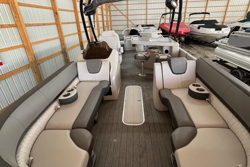 Slide: The Image of 2021 Avalon Catalina Entertainer 25' pontoon boat interior with spacious seating. - 24