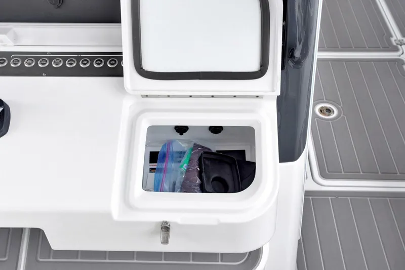 Slide: The Image of Open storage compartment on Freeman 47T boat, showcasing interior space and accessories. - 13