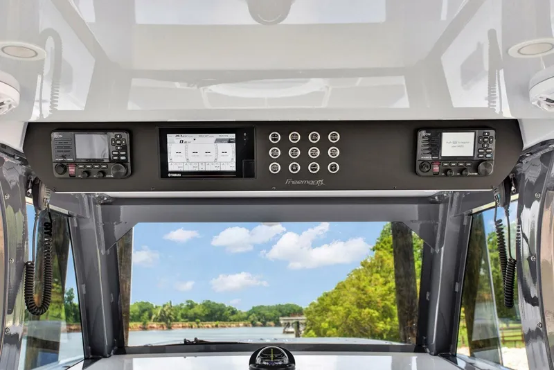 Slide: The Image of Control panel of 2022 Freeman 47T boat with navigation and communication systems. - 27