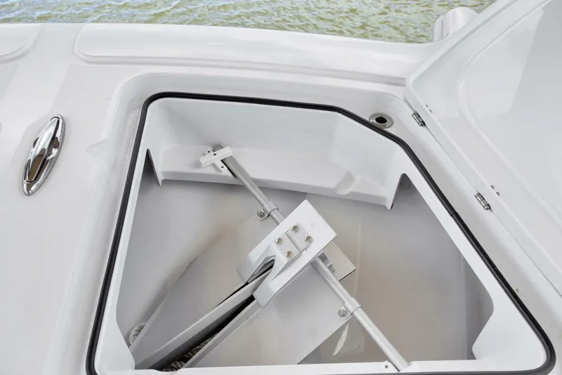 Slide: The Image of Open storage compartment on a 2022 Freeman 47T boat, showing interior details. - 33