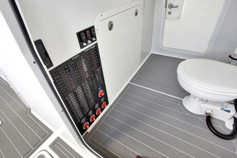 Slide: The Image of Freeman 47T 2022 boat interior with control panel and marine toilet. - 35