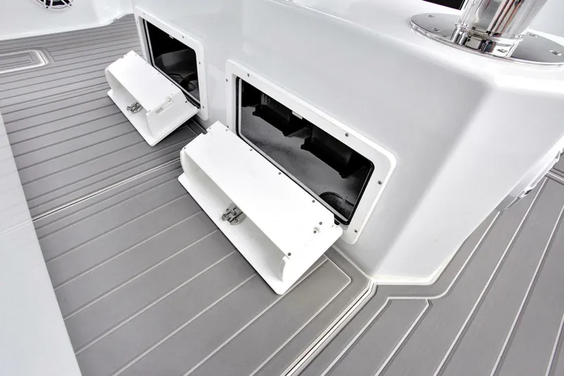 Slide: The Image of Open storage compartments on a 2022 Freeman 47T boat deck. - 39