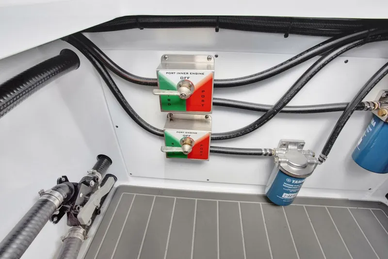 Slide: The Image of Engine control panel with switches and wiring in a 2022 Freeman 47T boat. - 47