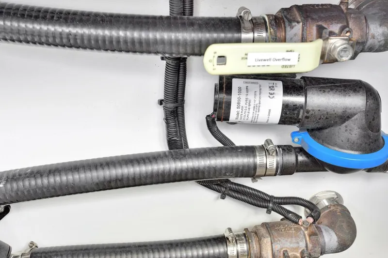 Slide: The Image of Boat plumbing system with hoses and fittings, Freeman 47T, 2022 model. - 49