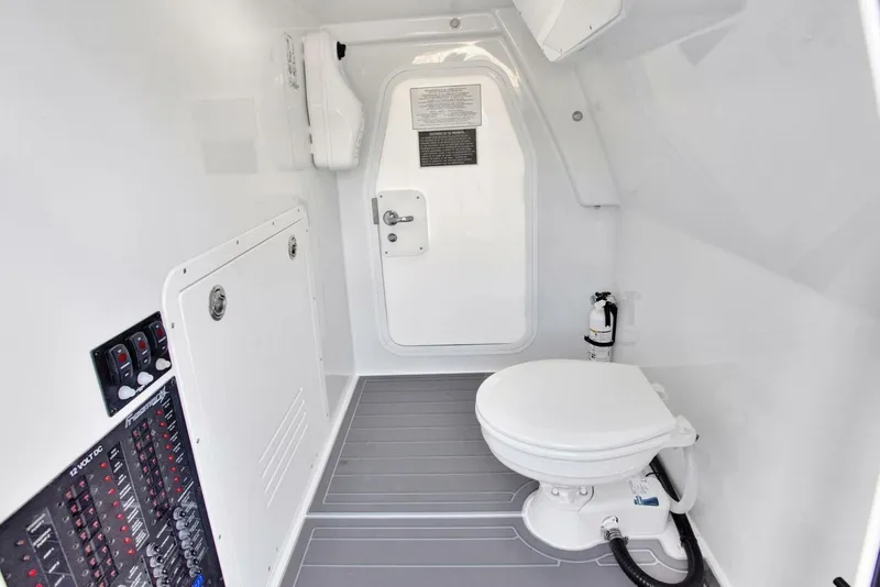 Slide: The Image of Freeman 47T 2022 boat interior with toilet and control panel. - 8
