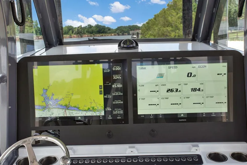 Slide: The Image of Dashboard of 2022 Freeman 47T boat with navigation and speed displays. - 9