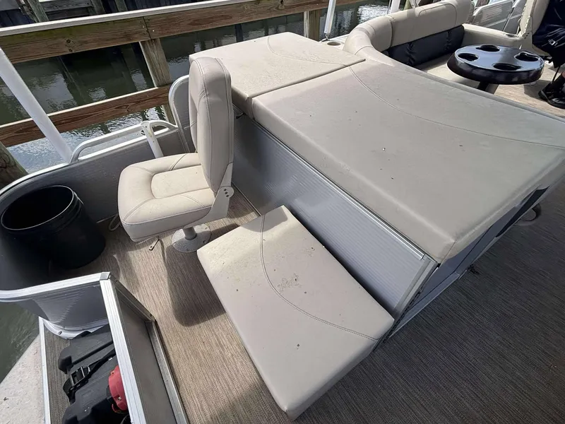 Slide: The Image of 2019 Misty Harbor 2085 Adventure CF boat interior with beige seating and table. - 11