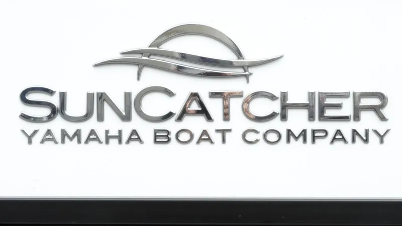 Slide: The Image of SunCatcher Yamaha Boat Company logo, 2025 SunCatcher Select 322RC model branding. - 13