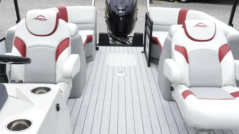 Slide: The Image of 2025 SunCatcher Select 322RC boat interior with plush seating and modern design. - 15