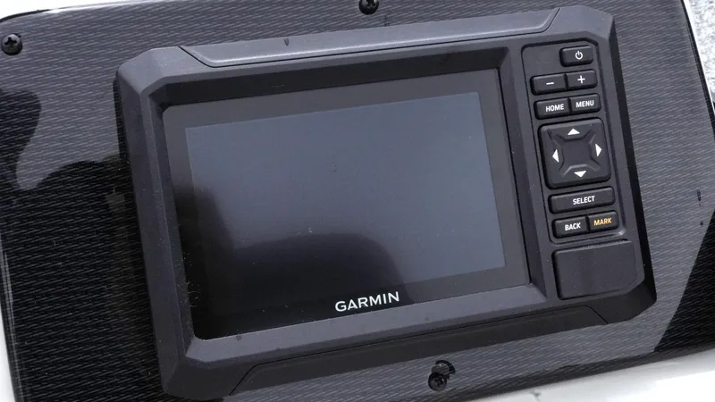 Slide: The Image of Garmin display on 2025 SunCatcher Select 322RC boat dashboard. - 19