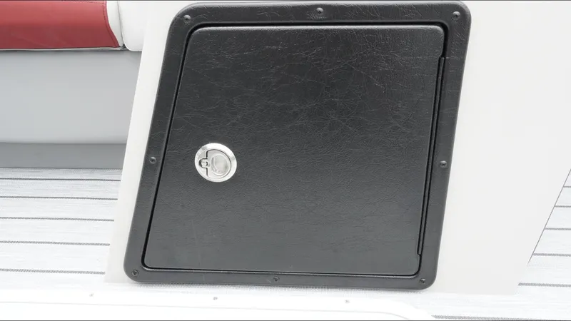 Slide: The Image of Black storage compartment on 2025 SunCatcher Select 322RC boat. - 32