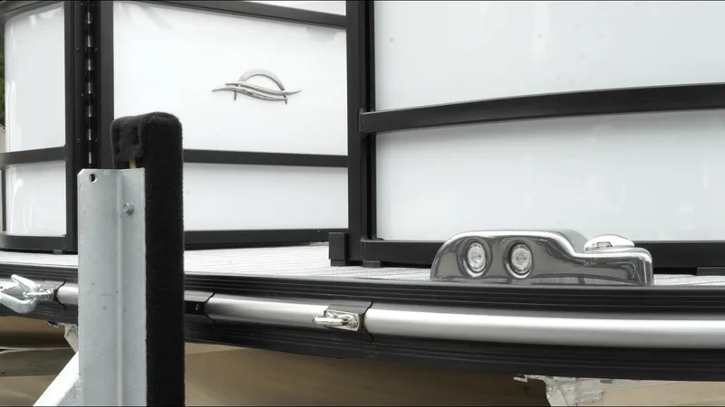 Slide: The Image of 2025 SunCatcher Select 322RC pontoon boat detail with sleek design and modern features. - 35