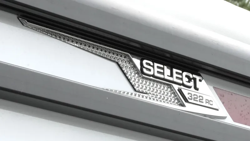 Slide: The Image of 2025 SunCatcher Select 322RC logo on a sleek metallic surface. - 36