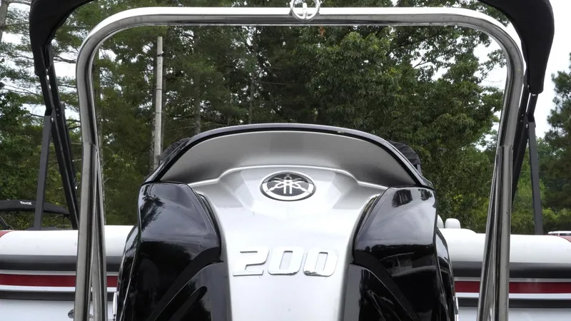 Slide: The Image of 2025 SunCatcher Select 322RC boat engine, featuring a sleek design and 200 horsepower. - 6
