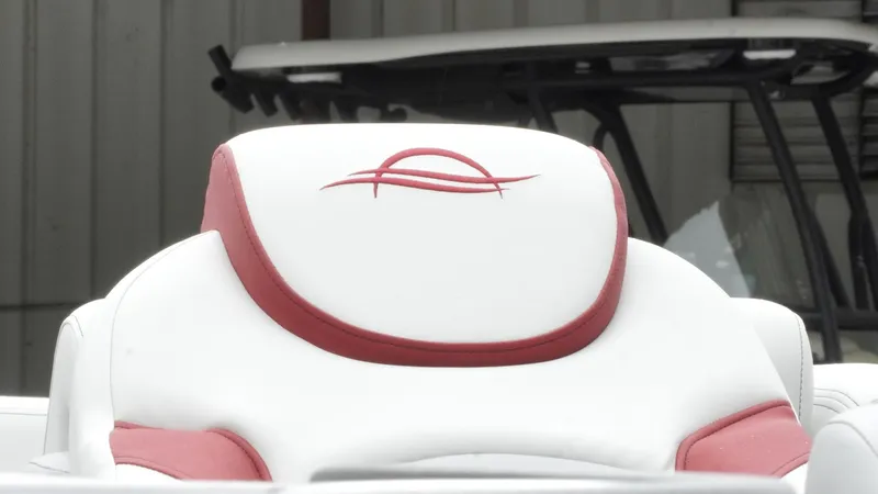 Slide: The Image of SunCatcher Select 322RC 2025 boat seat with red and white design. - 8