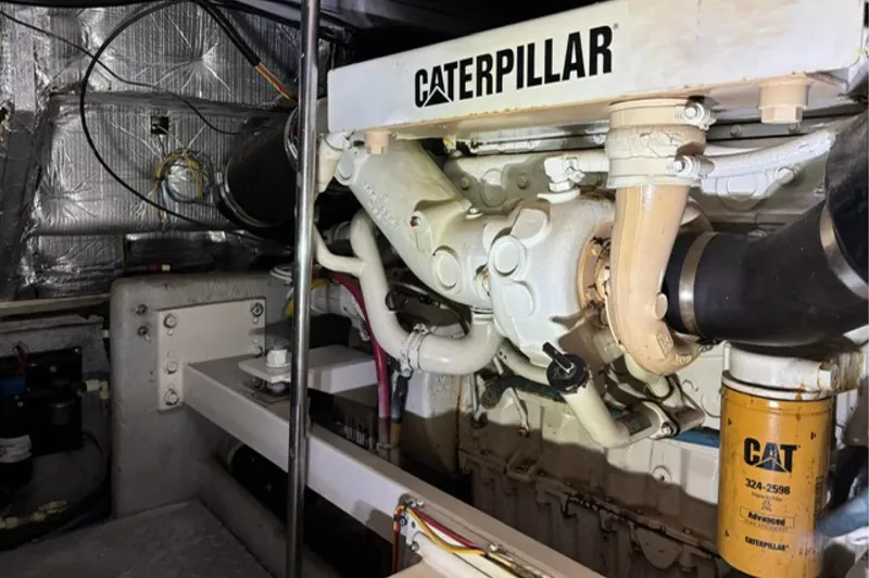 Slide: The Image of Engine room of 2002 Silverton 43 Motor Yacht with Caterpillar engine components. - 19