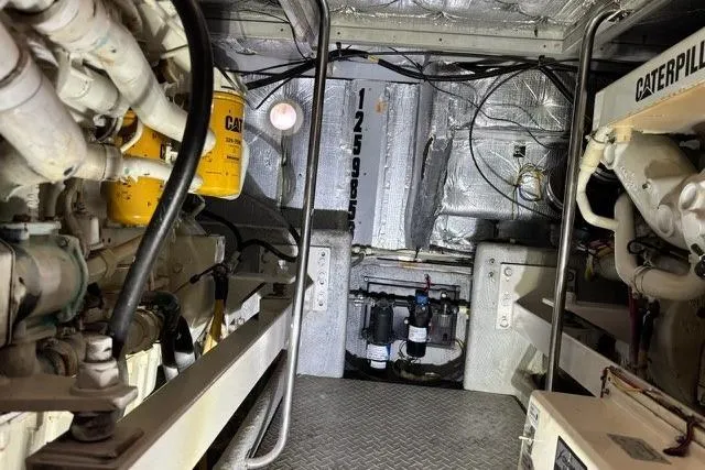 Slide: The Image of Engine room of a 2002 Silverton 43 Motor Yacht with Caterpillar machinery. - 20